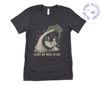 Super soft Bella + Canvas brand tee in dark heather grey. This shirt from Blue June Outfitters' exclusive Morbid Nature Collection features a skeleton holding a beer in a hammock, camping on the beach. Underneath it reads leave me here to die. Perfect camping tee for those with a dark sense of humor!