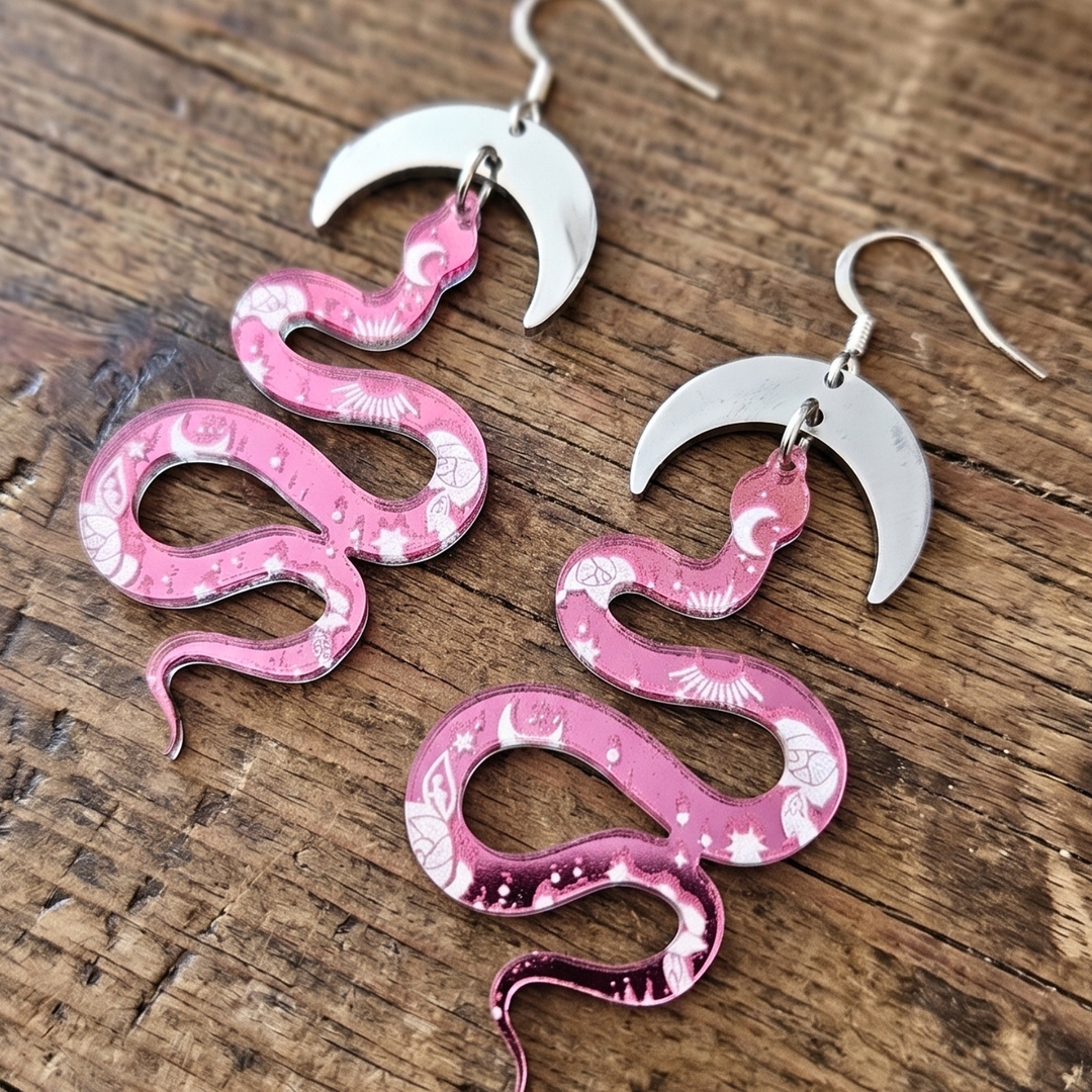 Pink Cosmic Serpent Earrings: Acrylic Snake & Steel Moon Statement Hoops
