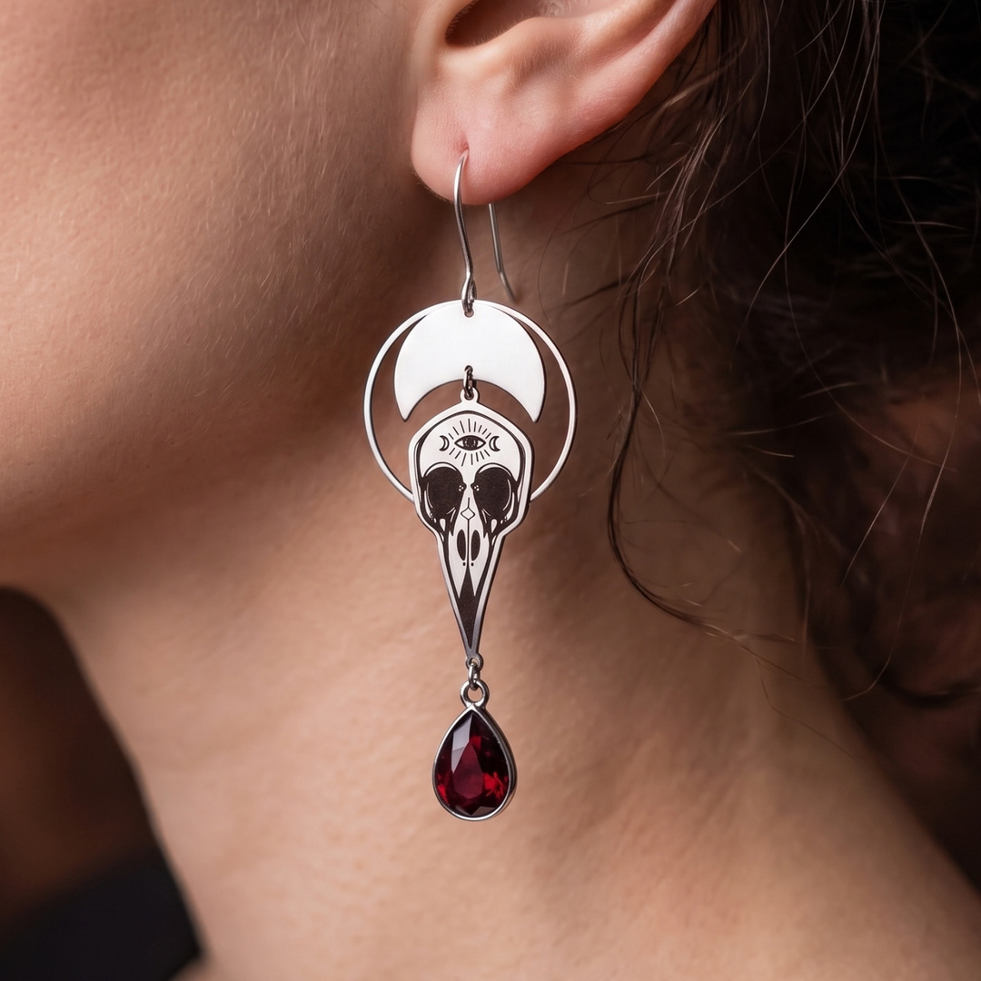 Crescent Moon & Raven Skull Drop Earrings | Stainless Steel & Garnet Glass Crystal