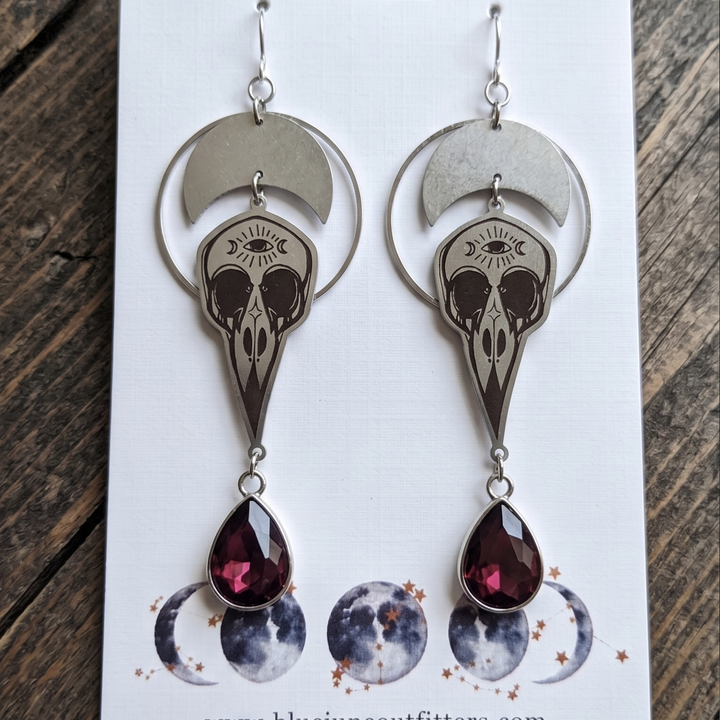 Crescent Moon & Raven Skull Drop Earrings | Stainless Steel & Garnet Glass Crystal