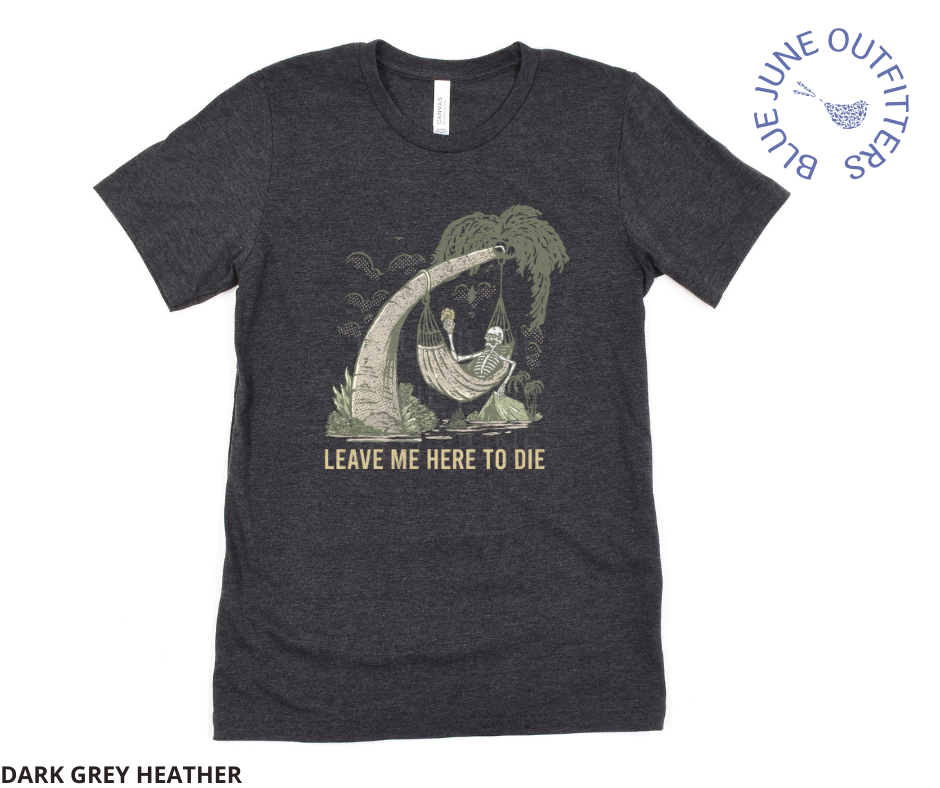 Super soft Bella + Canvas brand tee in dark heather grey. This shirt from Blue June Outfitters' exclusive Morbid Nature Collection features a skeleton holding a beer in a hammock, camping on the beach. Underneath it reads leave me here to die. Perfect camping tee for those with a dark sense of humor!
