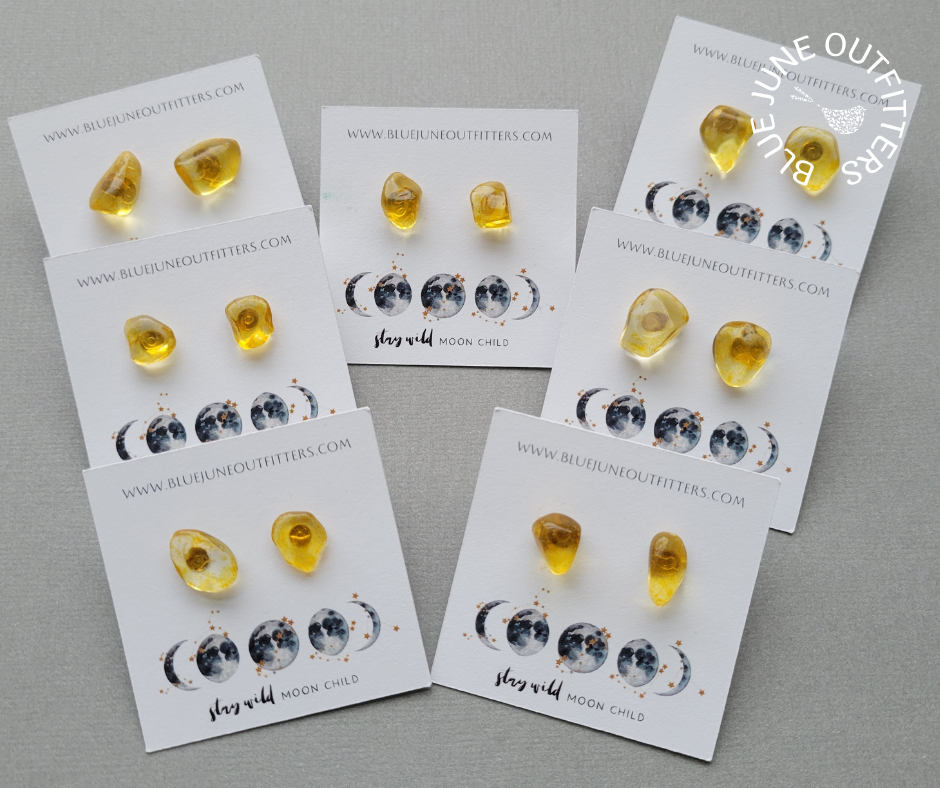 This photo shows seven separate pairs together on earring cards. All vary in shapes colors and sizes.
