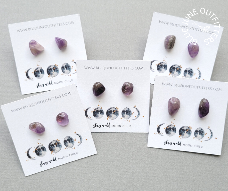 Photo shows five separate sets of amethyst studs to represent the variations to expect.  Each pair varies in shape, size and color. 