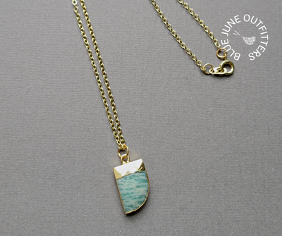Gold plated necklace with electroplated amazonite gemstone pendant, shaped as a horn and electroplated.